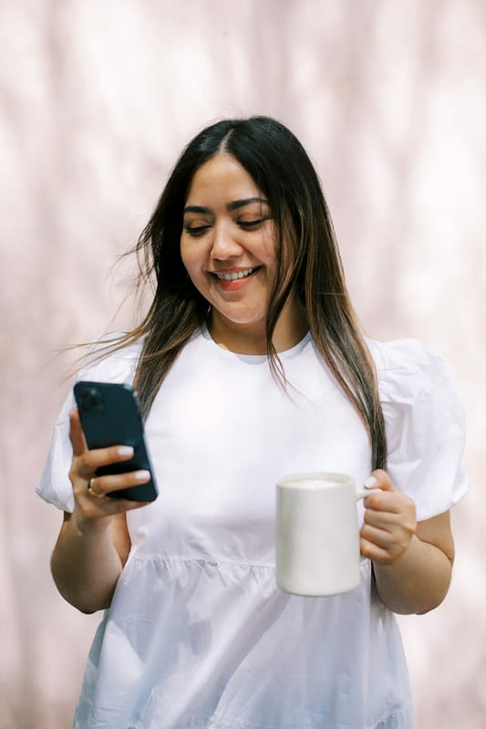 woman holding a phone