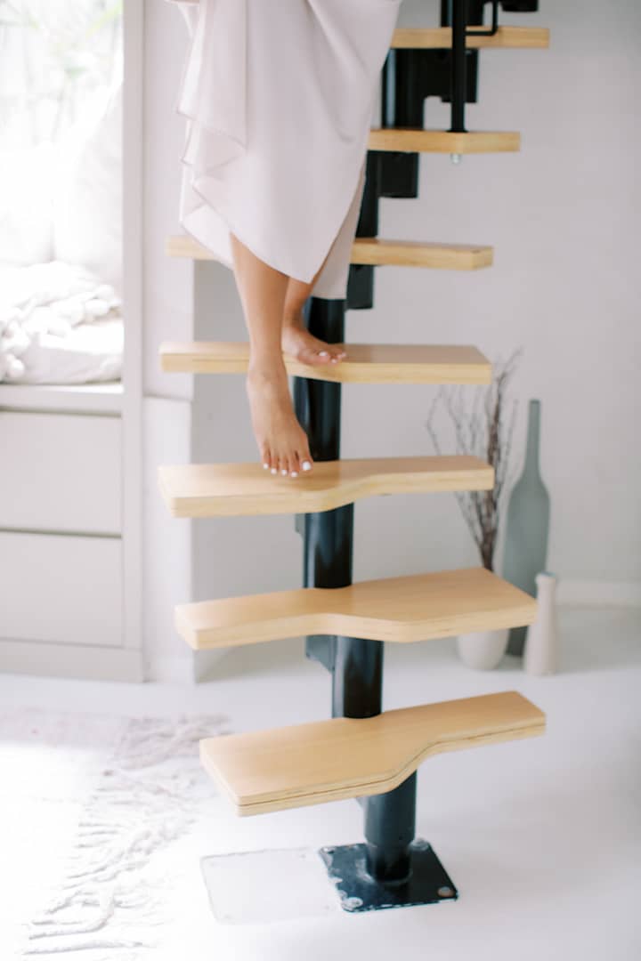 woman walking up the stairs